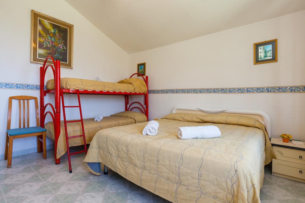 Chambre Quadruple avec Salle de Bains Privative